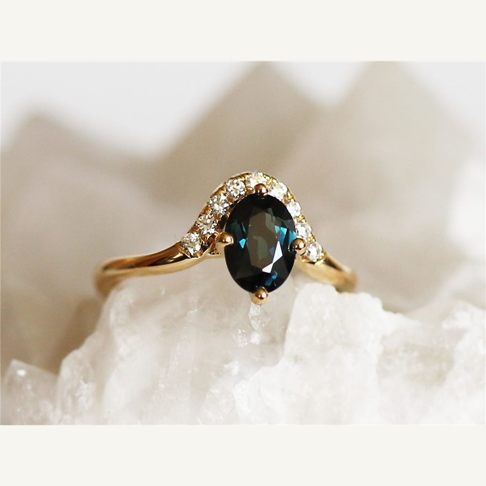 Australian teal sapphire and diamond engagement ring