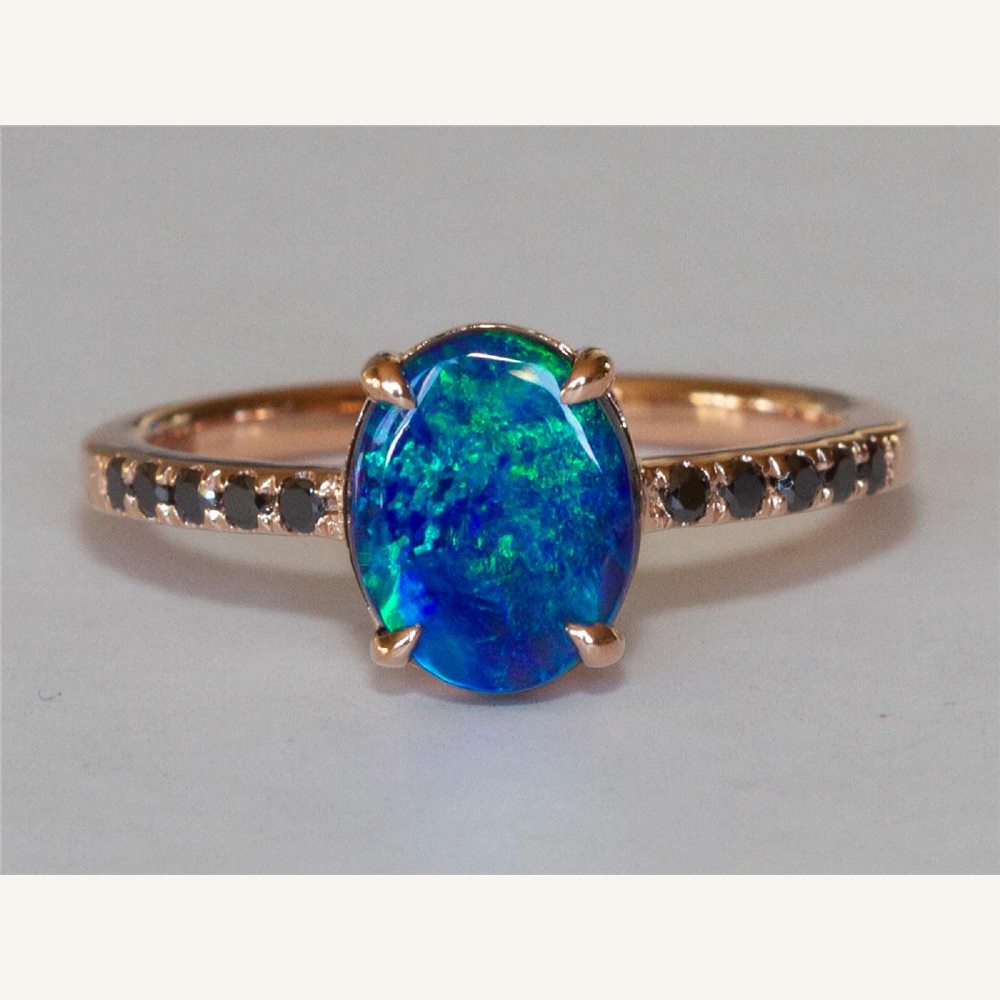 Lightning Ridge black opal and diamond engagement ring